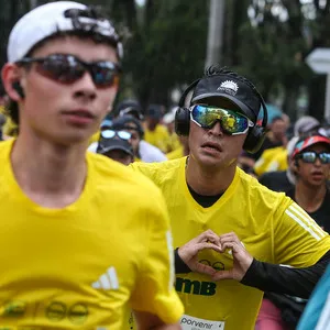 Atleta orgulloso de participar en la media maraton de bogota